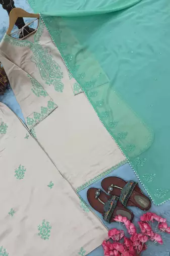 Ivory roman silk blend palazzo suit with embroidered georgette dupatta