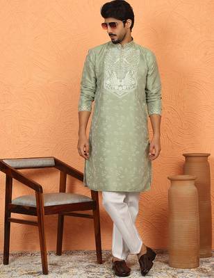 Silk jacquard embroidered floral design straight green kurta with white trouser 1