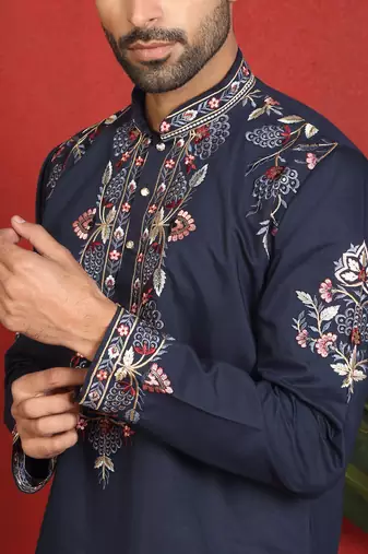 Cotton silk embroidered daman work blue kurta with bell bottom trouser