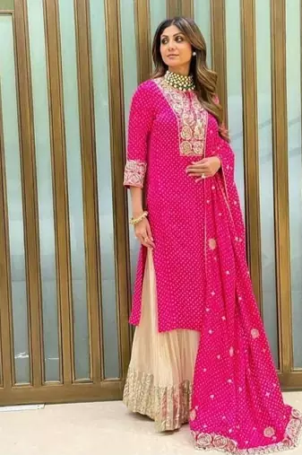 Pink fox georgette sharara suit with embroidered dupatta