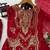 Red faux georgette embroidered sharara suit set with dupatta