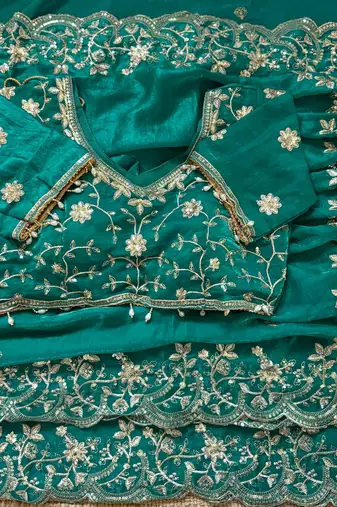Teal fendy satin party wear saree with embroidered blouse