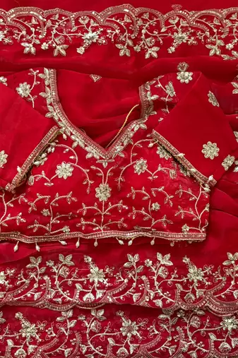 Red fendy satin party wear saree with embroidered blouse