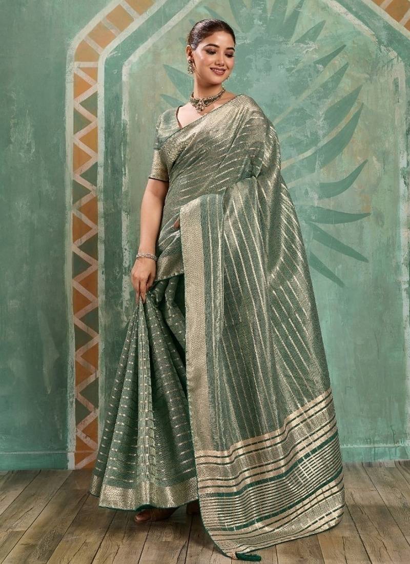 Sage green cotton tissue zari woven saree with broad patta & running blouse