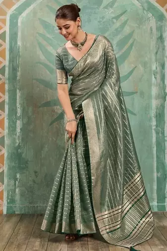 Sage green cotton tissue zari woven saree with broad patta & running blouse