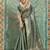Sage green cotton tissue zari woven saree with broad patta & running blouse