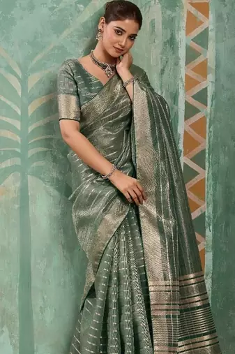 Sage green cotton tissue zari woven saree with broad patta & running blouse