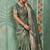 Sage green cotton tissue zari woven saree with broad patta & running blouse