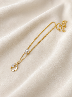 Gold-tone pearl and crystal moon pendant necklace 1