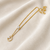 Gold-tone pearl and crystal moon pendant necklace