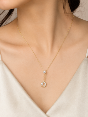 Gold-tone pearl and crystal moon pendant necklace 2