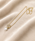 Pearl drop pendant necklace with floral cz, gold-tone chain