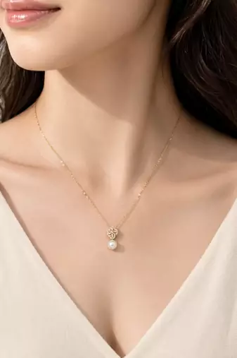 Pearl drop pendant necklace with floral cz, gold-tone chain