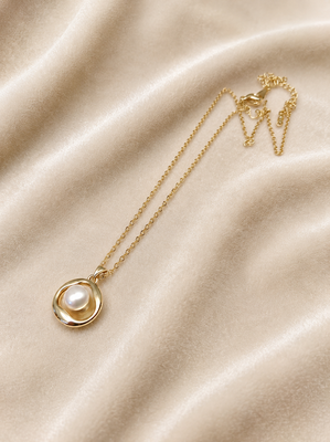 Gold-tone pearl pendant necklace with round swirl setting 1