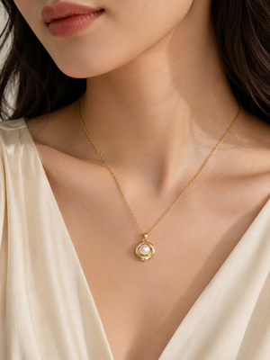 Gold-tone pearl pendant necklace with round swirl setting 2