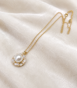 Pearl pendant necklace with crystal halo, gold-tone chain
