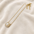 Pearl pendant necklace with gold-tone rope frame chain