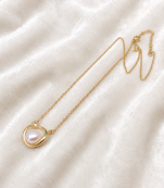Pearl pendant necklace with gold-tone heart frame and crystal