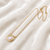 Pearl pendant necklace with gold-tone heart frame and crystal