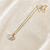 Pearl pendant necklace with ginkgo leaf design, gold chain