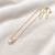 Pearl pendant necklace with crystal accents, gold chain