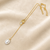 Gold-plated lariat necklace with freshwater pearl pendant
