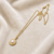 Pearl pendant necklace with gold-tone milgrain bezel setting