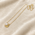 Pearl pendant necklace with gold-tone square frame