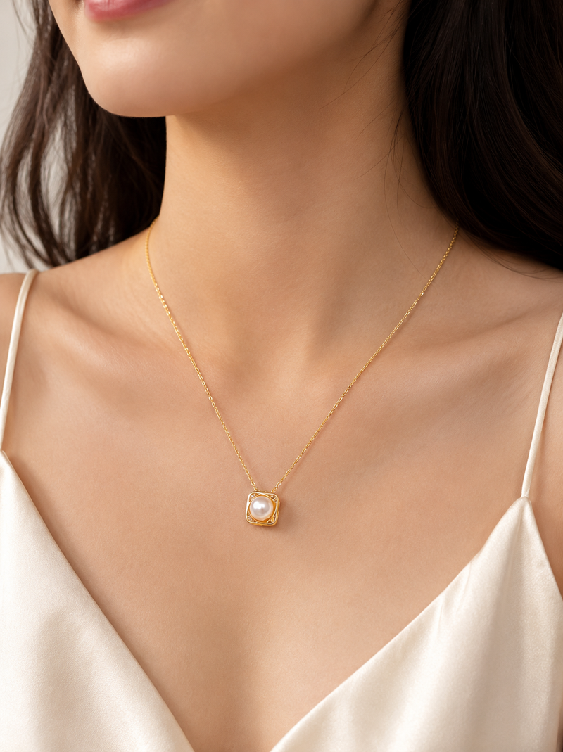 Pearl pendant necklace with gold-tone square frame