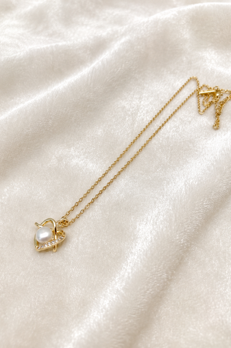 Pearl heart pendant necklace with crystal accents, gold-tone
