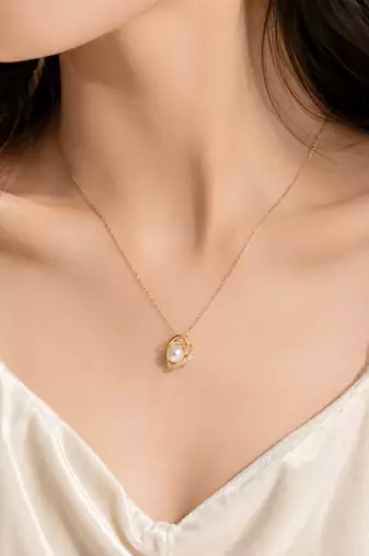 Pearl heart pendant necklace with crystal accents, gold-tone