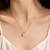 Pearl heart pendant necklace with crystal accents, gold-tone
