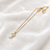 Pearl pendant necklace with crystal accent, gold-tone chain