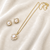 Pearl and crystal halo pendant necklace and stud earrings set