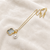 Mother of pearl clover and freshwater pearl pendant necklace