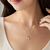 Mother of pearl clover and freshwater pearl pendant necklace