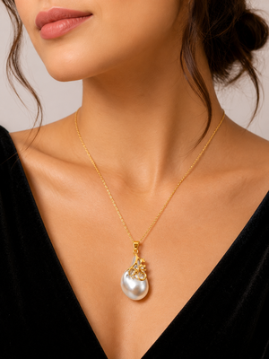 Baroque pearl pendant necklace with gold floral setting 1