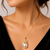 Baroque pearl pendant necklace with gold floral setting
