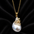 Baroque pearl pendant necklace with gold floral setting