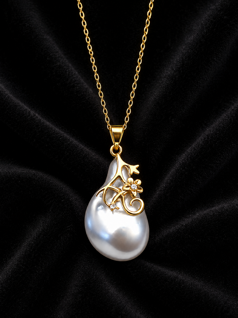 Baroque pearl pendant necklace with gold floral setting