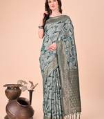 Teal green floral print cotton silk blend saree with zari pallu