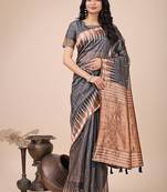 Grey woven linen silk blend saree with metallic striped border