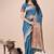 Teal blue woven linen silk blend saree with metallic striped border