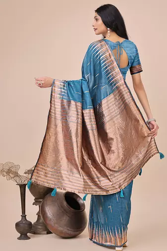 Teal blue woven linen silk blend saree with metallic striped border