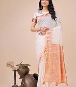 White woven linen silk blend saree with metallic striped border