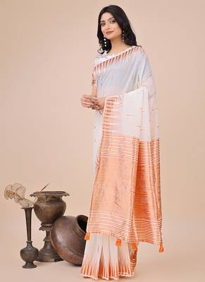 White woven linen silk blend saree with metallic striped border 3