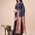 Navy blue woven linen silk blend saree with metallic striped border