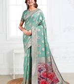 Sea green woven linen silk blend saree with floral print pallu