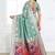 Sea green woven linen silk blend saree with floral print pallu