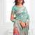 Sea green woven linen silk blend saree with floral print pallu